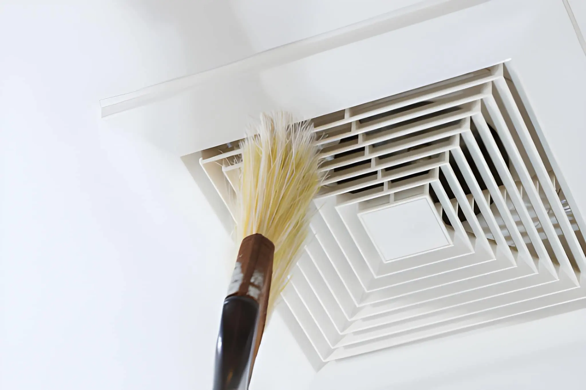AC vent cleaning removing dust and debris from residential air vents